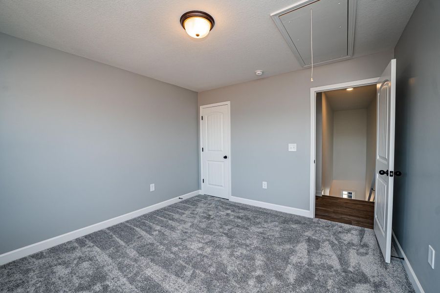 Representative unfurnished interior of a home built from the Sumter by Enchanted Homes in Lonesome Dove, San Antonio (Image 49).