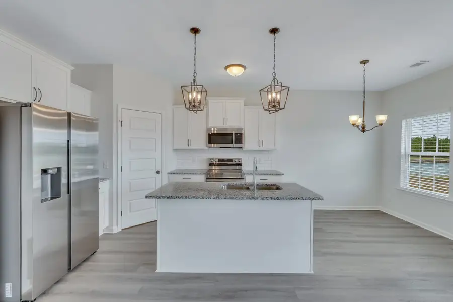 Representative furnished interior of a home built from the The Norman by RTS Homes in The Pointe at Villages on Marne, Hinesville (Image 11).