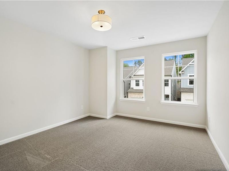 Spacious, unfurnished interior of a new home in The Village at Shallowford, Kennesaw (Image 24).