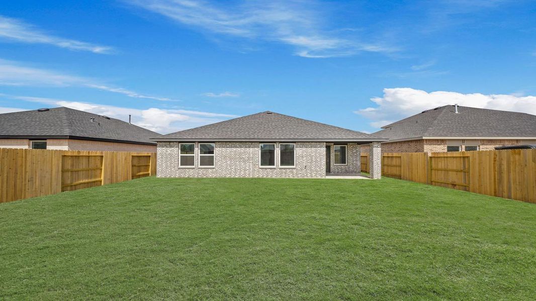 Exterior details and patio area of a home in Sunterra, Katy (Image 15).