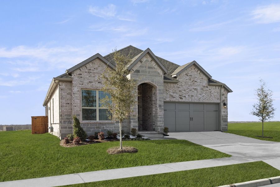 Front exterior of a new home in Brookshire at Legacy Hills, Celina, TX, highlighting curb appeal (Image 2). Front exterior of a new home in Brookshire at Legacy Hills, Celina, TX, highlighting curb appeal (Image 2).