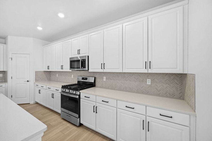 Furnished interior view inside a new home in Trailstone, Arvada (Image 12).