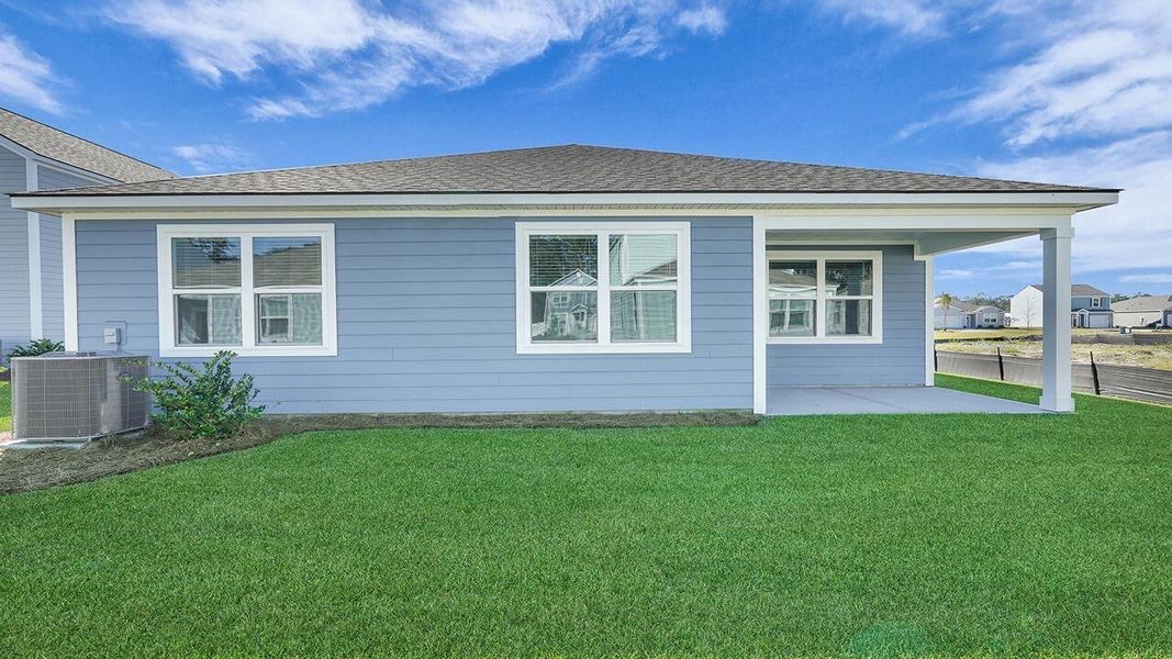 Exterior details and patio area of a home in Hillcrest, Ravenel (Image 16). Exterior details and patio area of a home in Hillcrest, Ravenel (Image 16).