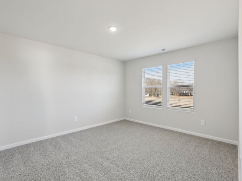 Primary bedroom in the Dakota floorplan at 199 White Birch Lane.