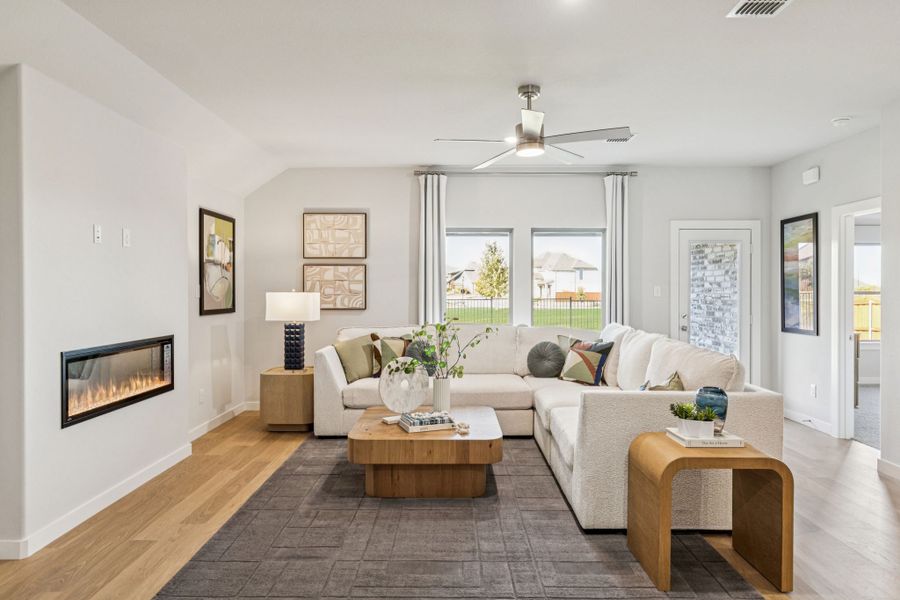 Living Room in the Oscar home plan by Trophy Signature Homes – REPRESENTATIVE PHOTO