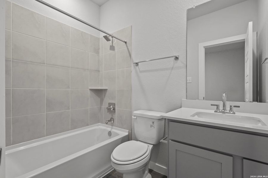 Furnished interior view inside a new home in Cinco Lakes, San Antonio (Image 8).