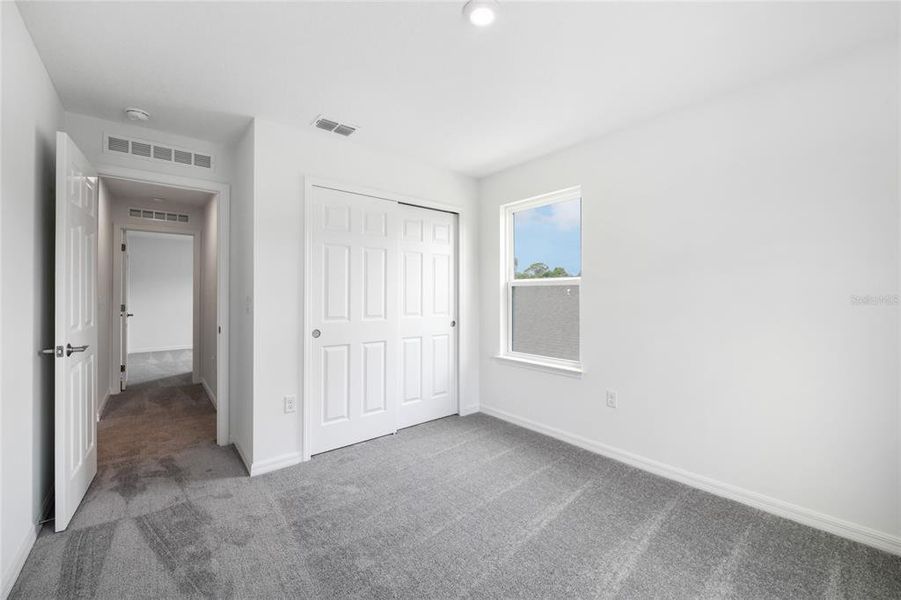 Spacious, unfurnished interior of a new home in Brack Ranch, St. Cloud (Image 22).