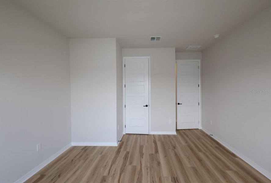 Spacious, unfurnished interior of a new home in Lakeside at Satilla, St. Cloud (Image 6).