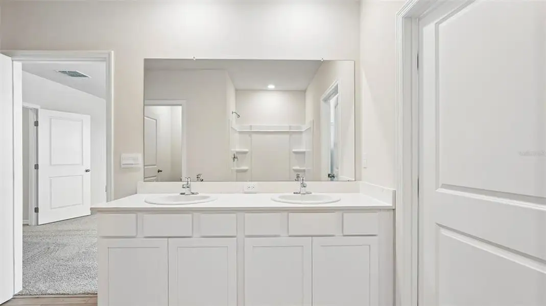 Furnished interior view inside a new home in Oakfield Trails, Parrish (Image 8). Furnished interior view inside a new home in Oakfield Trails, Parrish (Image 8).