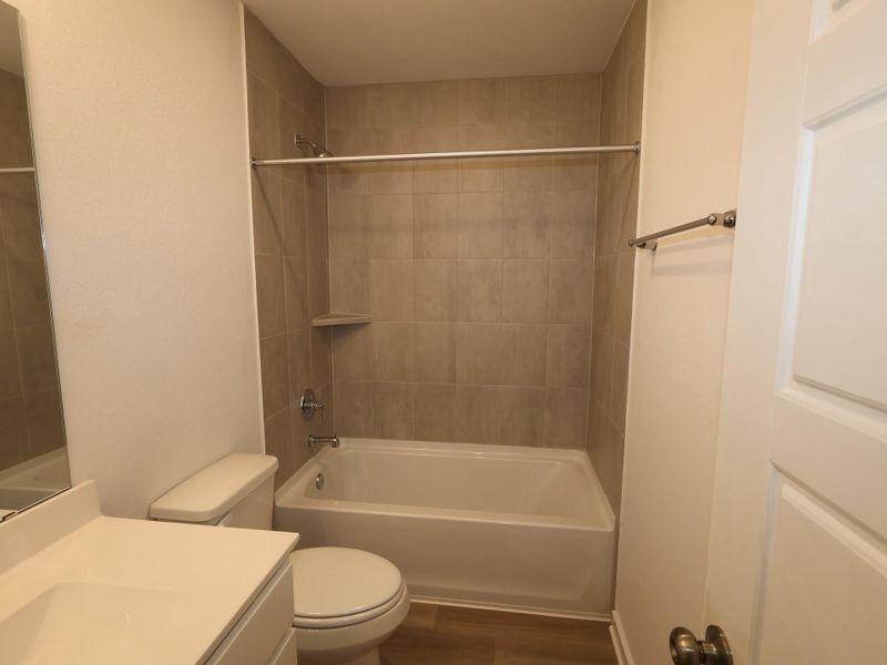 Furnished interior view inside a new home in Pinewood at Grand Texas, New Caney (Image 13).