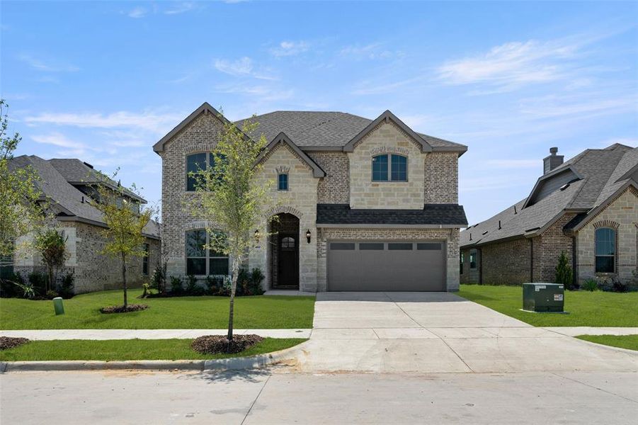 Front exterior of a new home in The Retreat - Phase 1, Waxahachie, TX, highlighting curb appeal (Image 1).