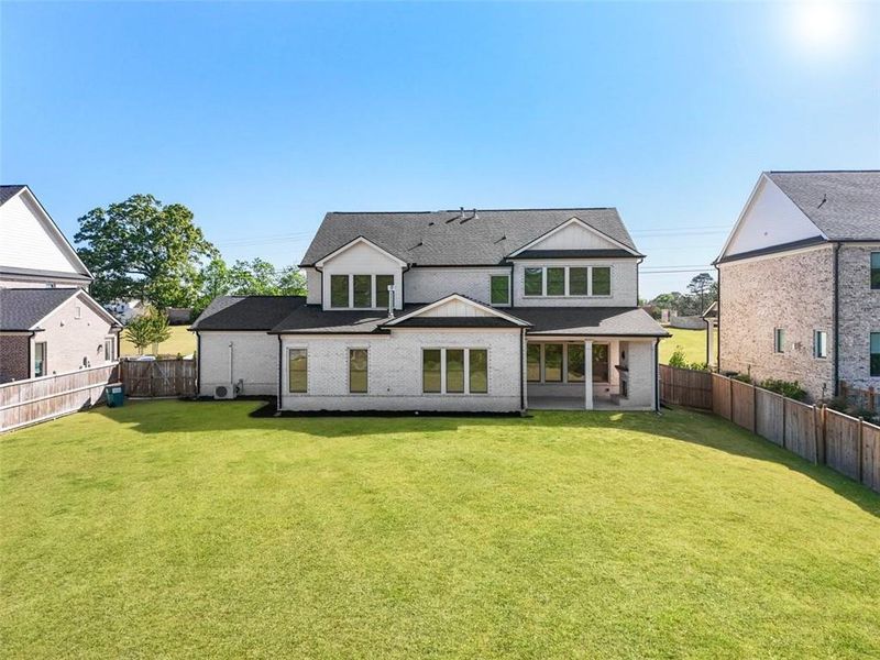Exterior details and patio area of a home in , Buford (Image 24).
