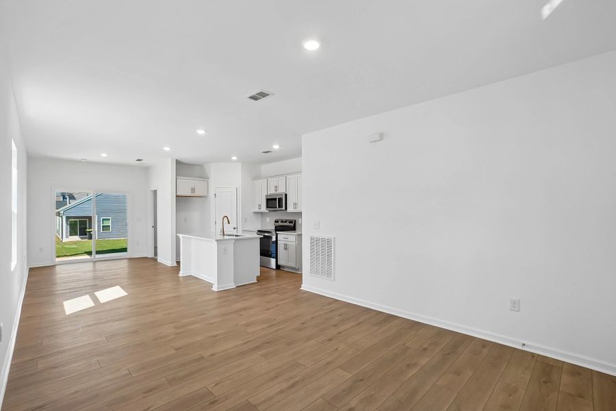 Family Room featuring the AW Collection® Serene - Open space with natural finishes and light.