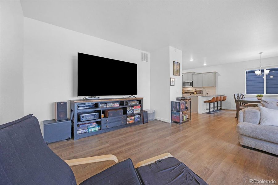 Open to the dining room and kitchen, this family room is expansive and functional.
