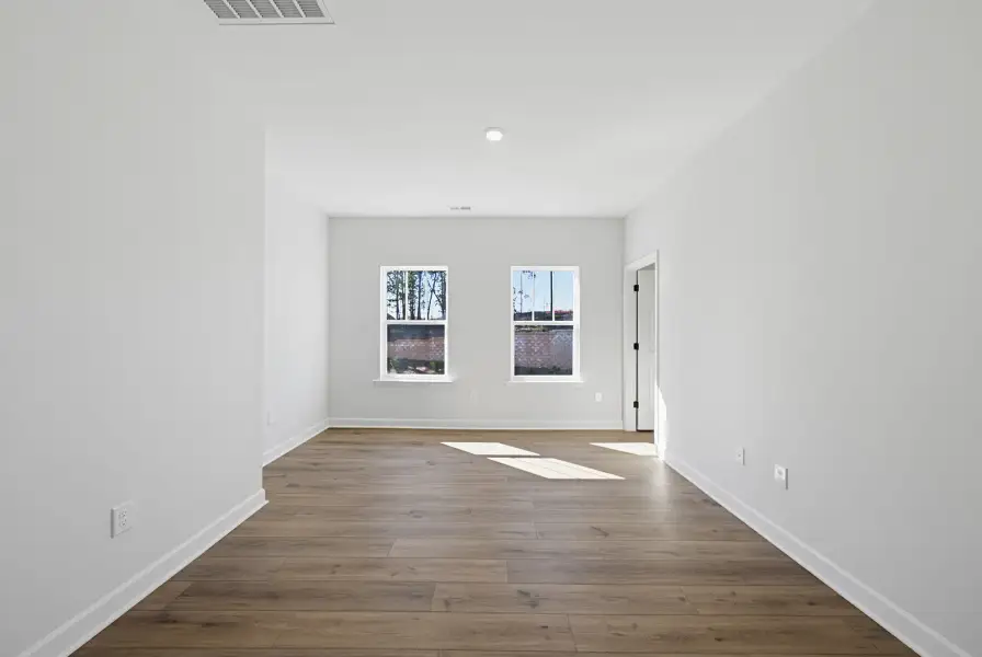 Spacious, unfurnished interior of a new home in Sweetbrier, Durham (Image 26).