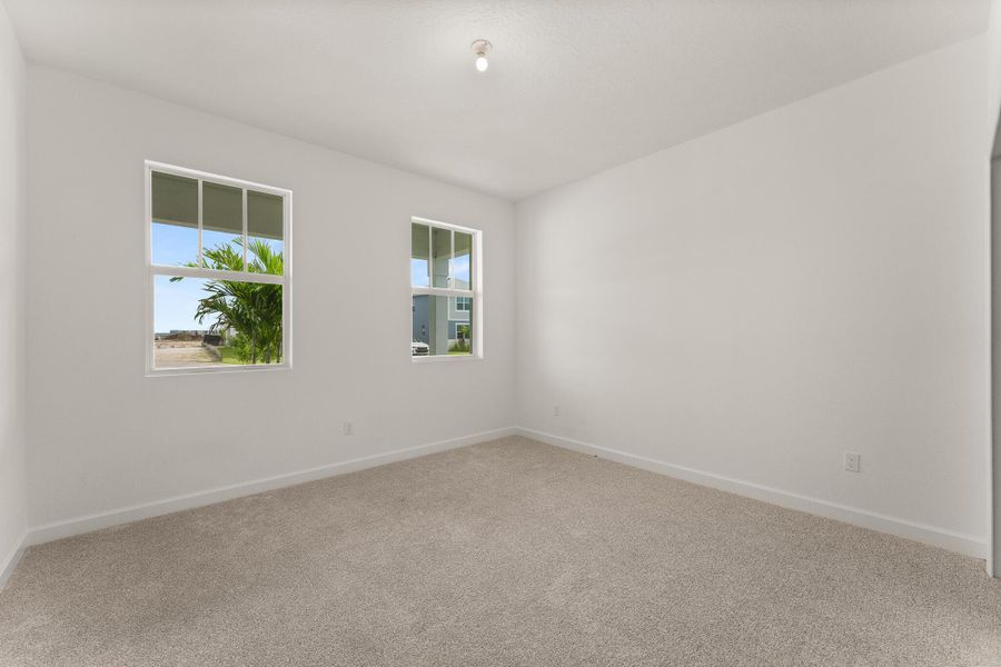 Spacious, unfurnished interior of a new home in Tradition - Cadence, Port St. Lucie (Image 14).