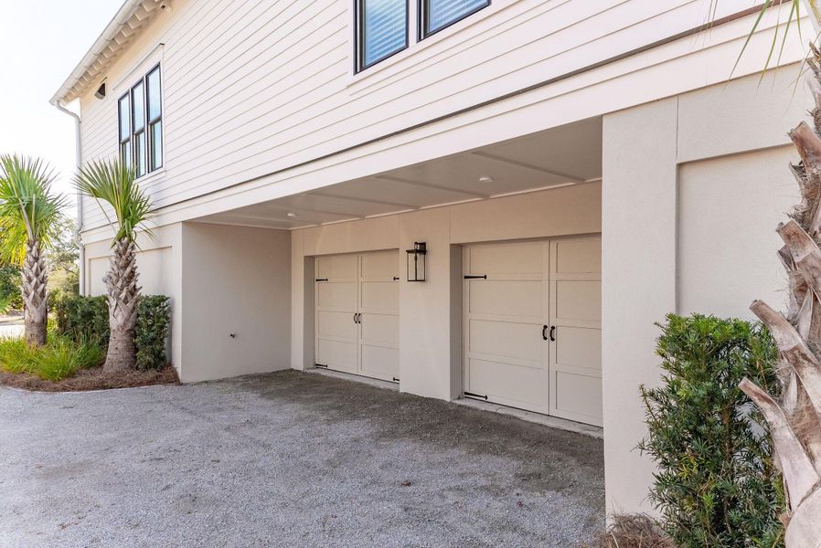 Exterior details and patio area of a home in Daniel Island Park, Charleston (Image 37).