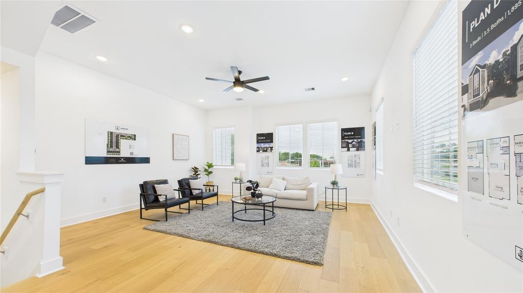 This stunning open-concept living area on the second floor offers a perfect blend of style and functionality, ideal for modern living. Expansive windows flood the space with natural light, enhancing the airy ambiance and highlighting the thoughtfully designed layout. This stunning open-concept living area on the second floor offers a perfect blend of style and functionality, ideal for modern living. Expansive windows flood the space with natural light, enhancing the airy ambiance and highlighting the thoughtfully designed layout.