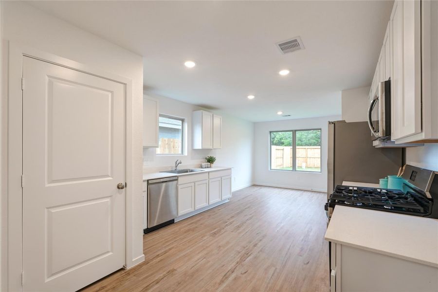 Furnished interior view inside a new home in Becker Landing, Hockley (Image 7).