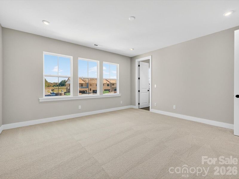 Light filled primary bedroom