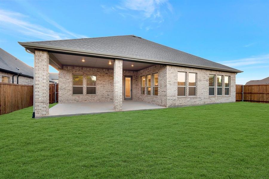 Exterior details and patio area of a home in Sterling Greene, Arlington (Image 24).