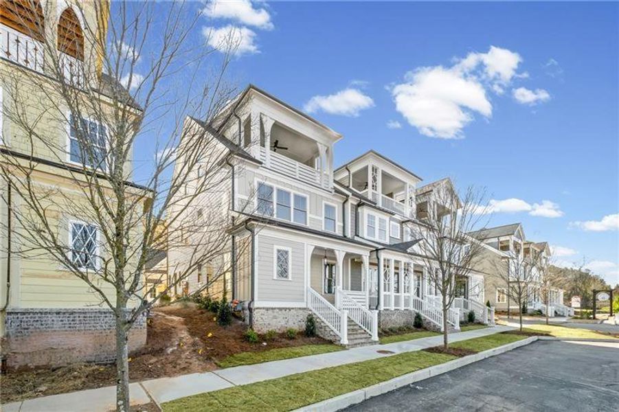 Front exterior of a new home in , Ball Ground, GA, highlighting curb appeal (Image 20).
