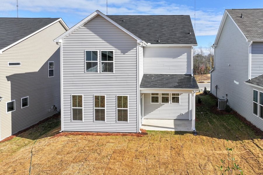 Exterior details and patio area of a home in Renaissance at White Oak, Garner (Image 3).