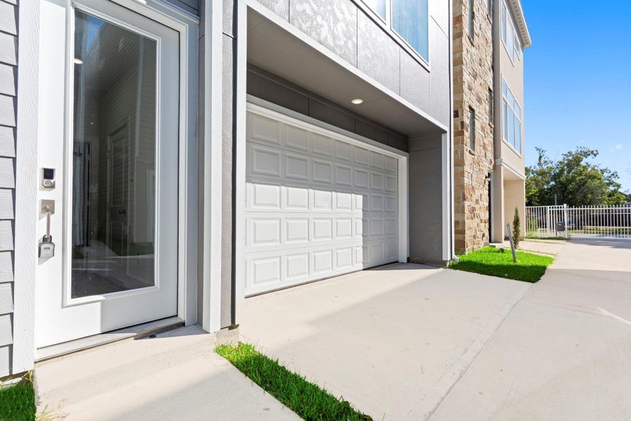 this modern home comes with an attached 2-car garage.