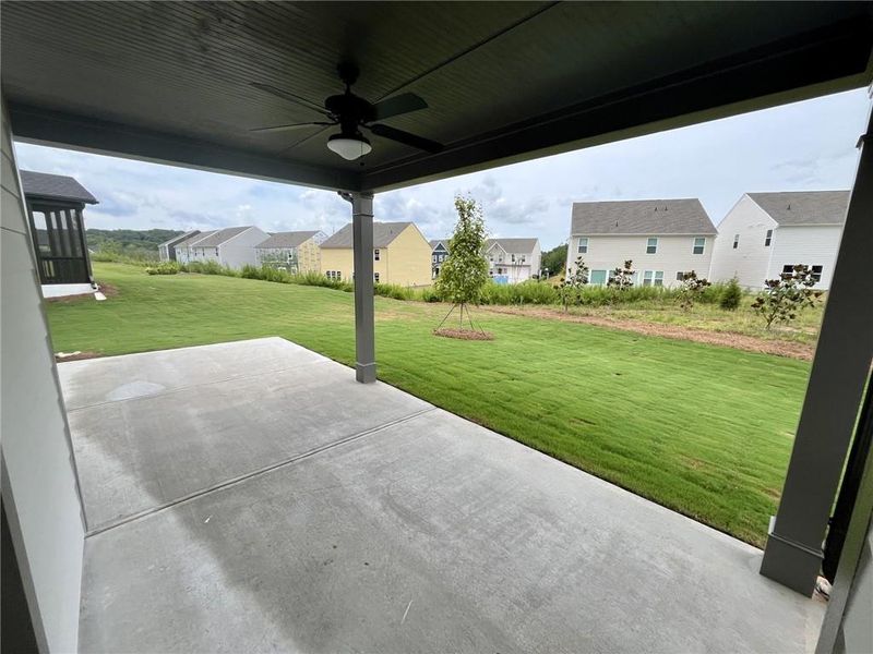 Exterior details and patio area of a home in Twin Lakes, Hoschton (Image 19).
