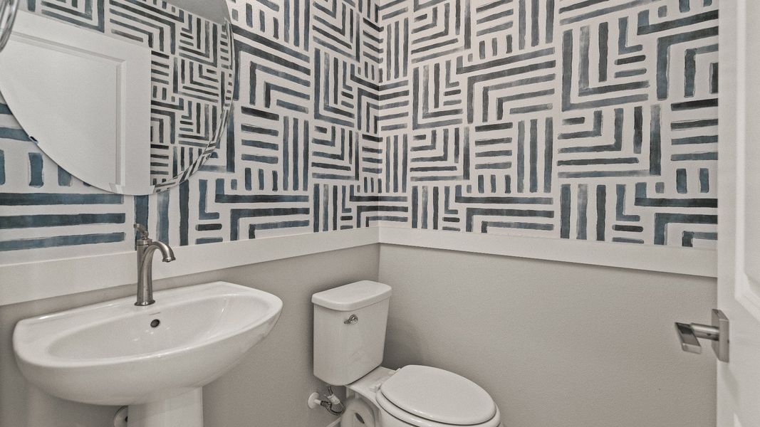 The First Floor Guest Bathroom in the Model Highbourne by DRB Homes in Hamilton Bluff located in Haines City, FL. The First Floor Guest Bathroom in the Model Highbourne by DRB Homes in Hamilton Bluff located in Haines City, FL.