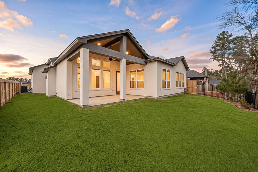 Exterior details and patio area of a home in Audubon 60’s, Magnolia (Image 21).