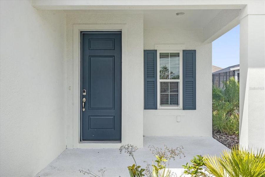 Exterior details and patio area of a home in Canoe Creek, Parrish (Image 22).