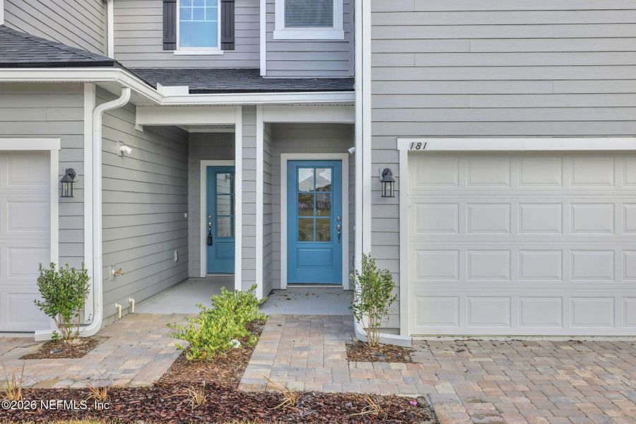 Exterior details and patio area of a home in Cherry Elm at SilverLeaf, St. Augustine (Image 3).