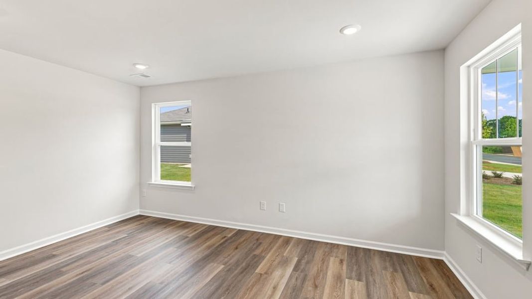 Spacious, unfurnished interior of a new home in Village 3, Woodruff (Image 15).