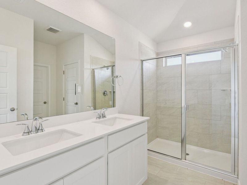 Primary suite bathroom in the Allen floorplan at a Meritage Homes community. Primary suite bathroom in the Allen floorplan at a Meritage Homes community.