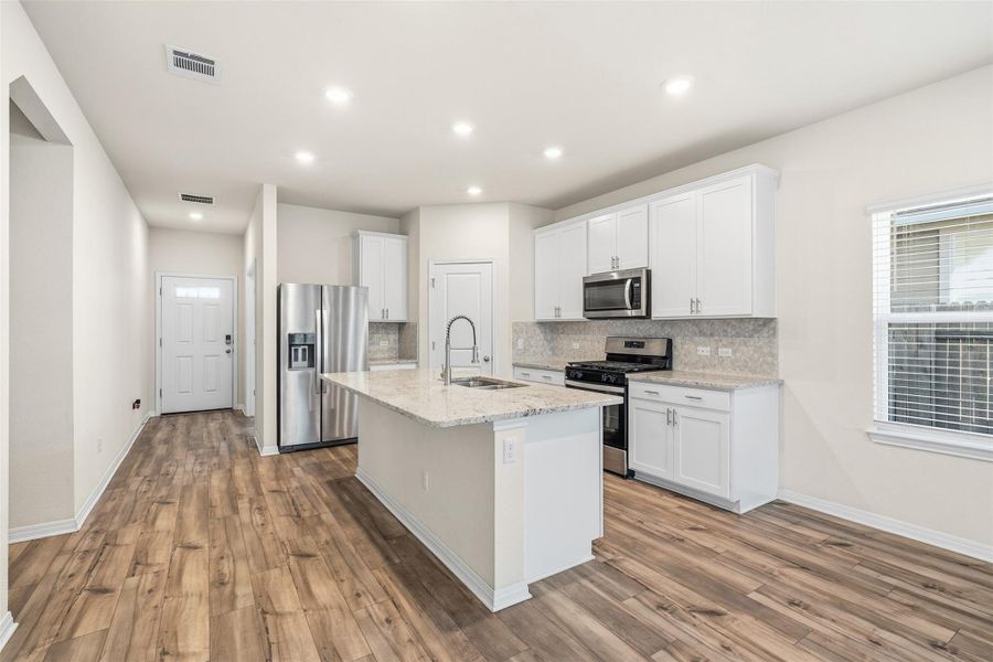 Furnished interior view inside a new home in Butler Farms - Reserve Collection, Liberty Hill (Image 10).