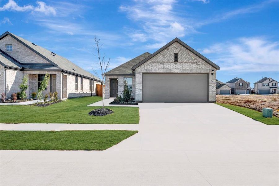 Front exterior of a new home in Meadow Park, Denton, TX, highlighting curb appeal (Image 2). Front exterior of a new home in Meadow Park, Denton, TX, highlighting curb appeal (Image 2).