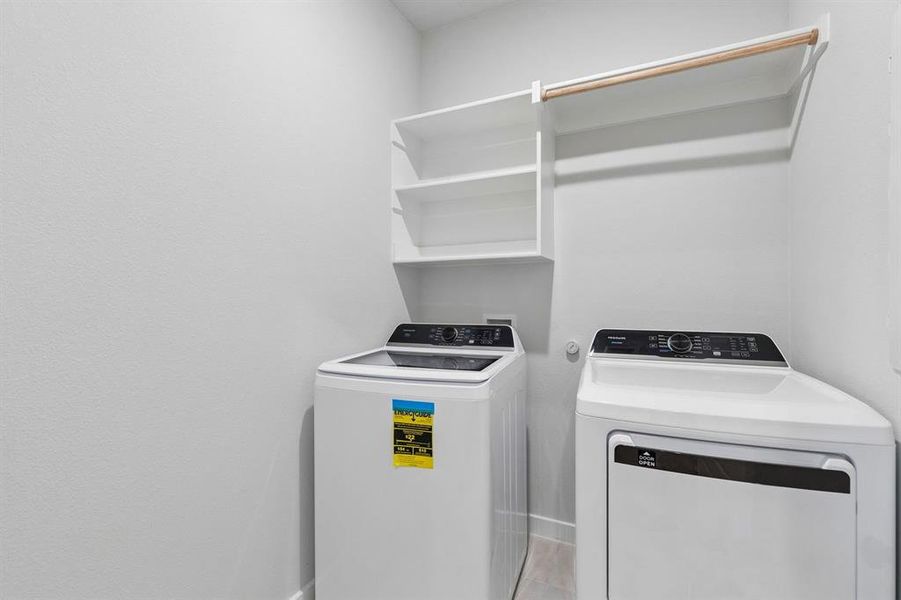 Utility Room in the Oscar home plan by Trophy Signature Homes – REPRESENTATIVE PHOTO