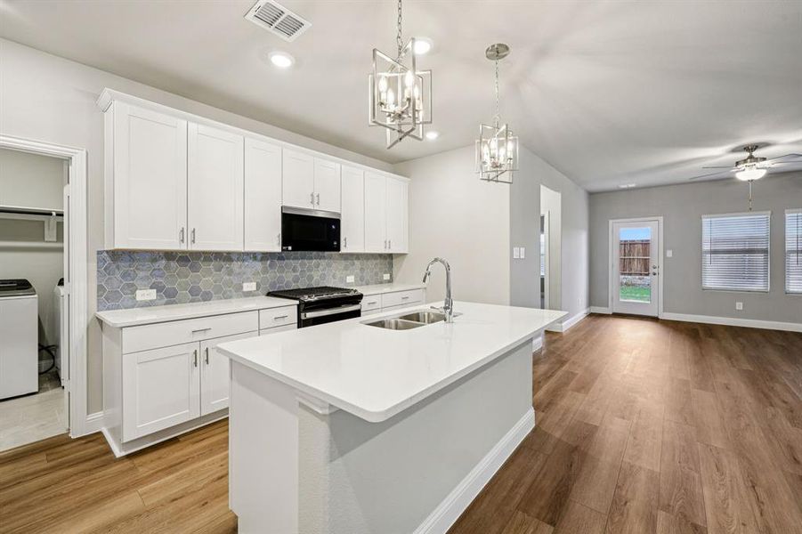 Furnished interior view inside a new home in Parks at Foster Crossing - Spring Series, Anna (Image 6).