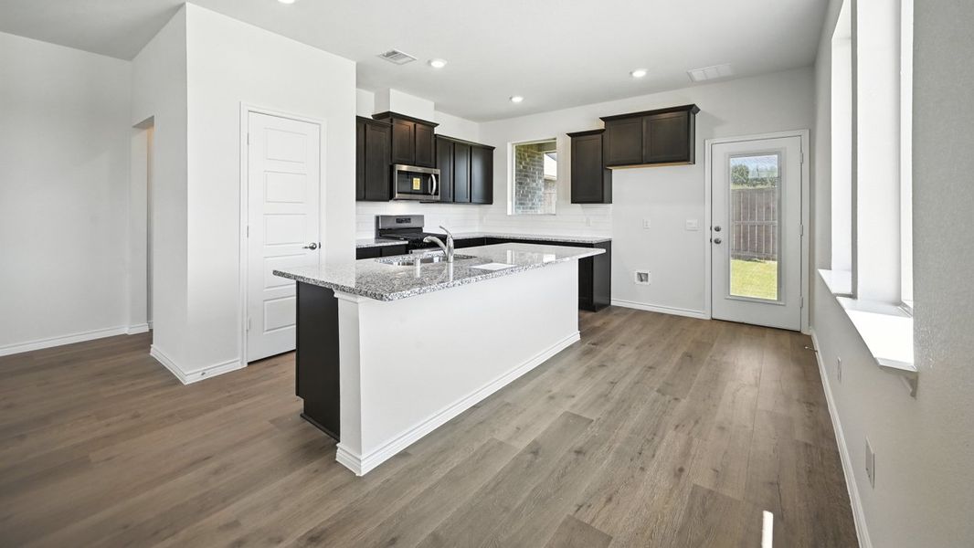 Furnished interior view inside a new home in The Woods at Lindsey Place, Anna (Image 4).