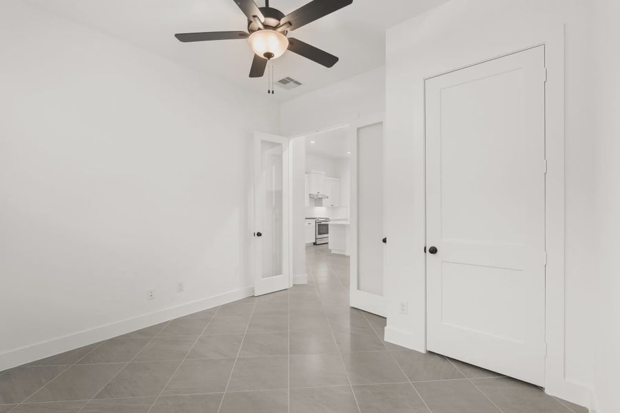 Representative unfurnished interior of a home built from the Palmer by Chesmar Homes in Riceland Alley Loads, Mont Belvieu (Image 41).