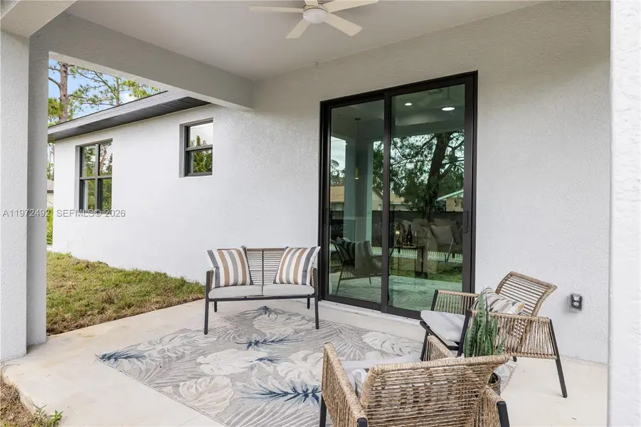Exterior details and patio area of a home in , North Port (Image 4).