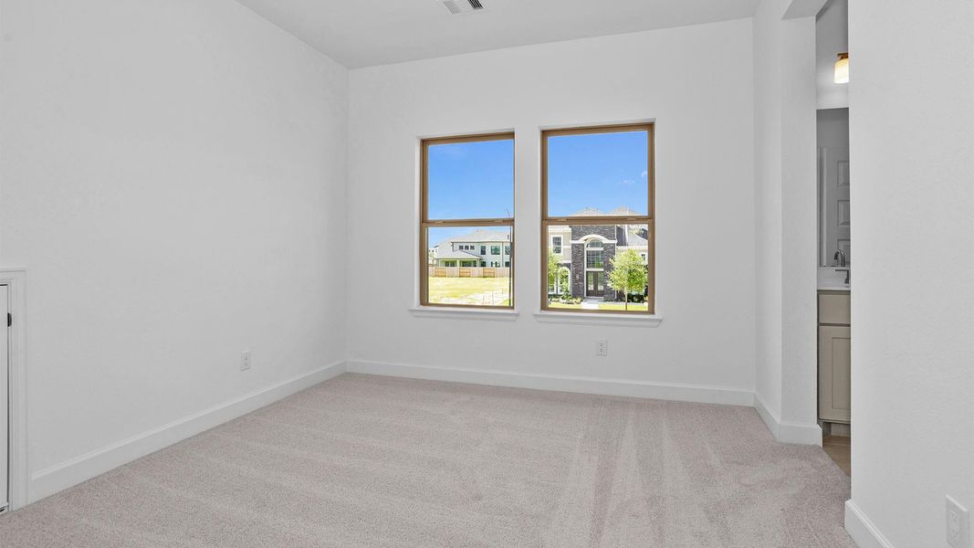 Spacious, unfurnished interior of a new home in Elyson, Katy (Image 7).