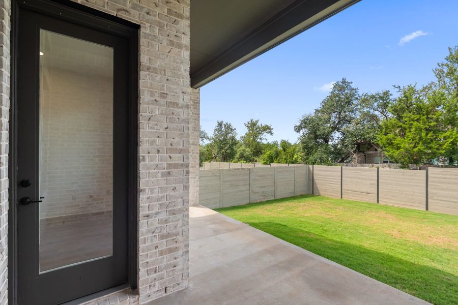 Exterior details and patio area of a home in Wolf Ranch, Georgetown (Image 4).