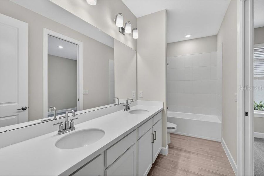 Furnished interior view inside a new home in Esplanade at Wiregrass Ranch, Wesley Chapel (Image 7).