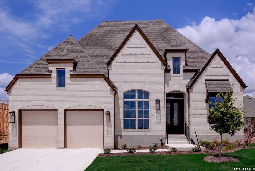 Front exterior of a new home in Mayfair, New Braunfels, TX, highlighting curb appeal (Image 1). Front exterior of a new home in Mayfair, New Braunfels, TX, highlighting curb appeal (Image 1).