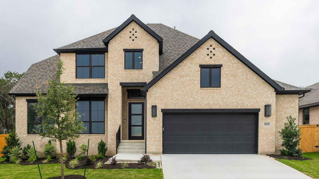 Front exterior of a new home in Parkside On The River, Georgetown, TX, highlighting curb appeal (Image 2). Front exterior of a new home in Parkside On The River, Georgetown, TX, highlighting curb appeal (Image 2).