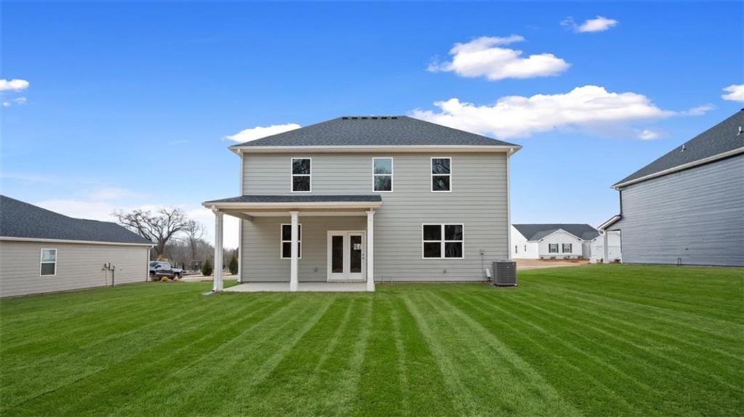 Exterior details and patio area of a home in Jackson Landing, Jefferson (Image 3).