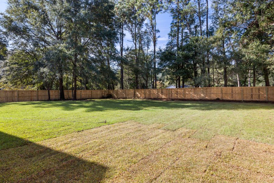 Exterior details and patio area of a home in , Johns Island (Image 3). Exterior details and patio area of a home in , Johns Island (Image 3).