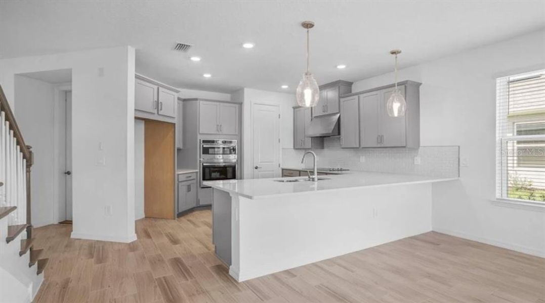 Furnished interior view inside a new home in Aden North at Westview, Kissimmee (Image 6). Furnished interior view inside a new home in Aden North at Westview, Kissimmee (Image 6).